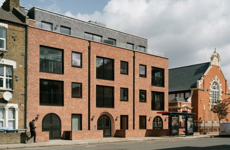 Artform's Harrow Road development features red bricks and curved features